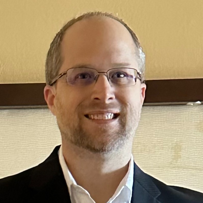 Headshot of Dan Lacher